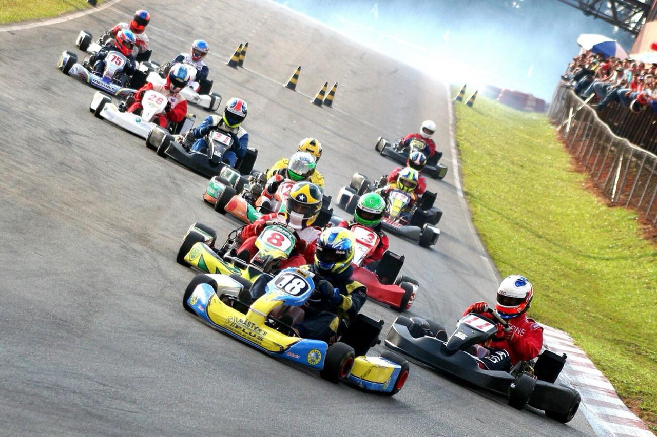 Karts racing in a pack