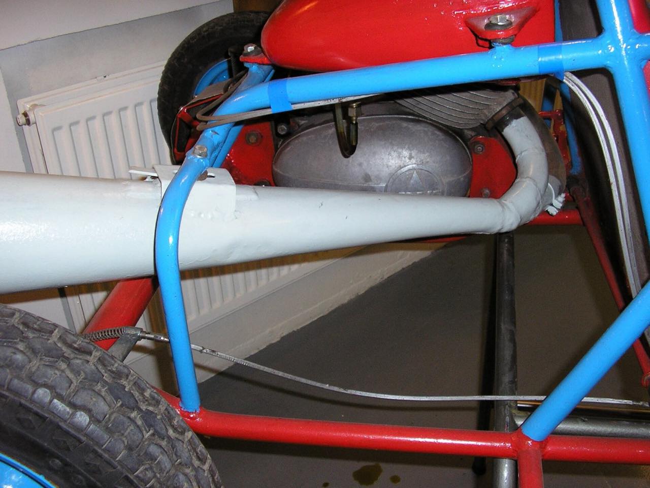 An engine mounted in a tube frame