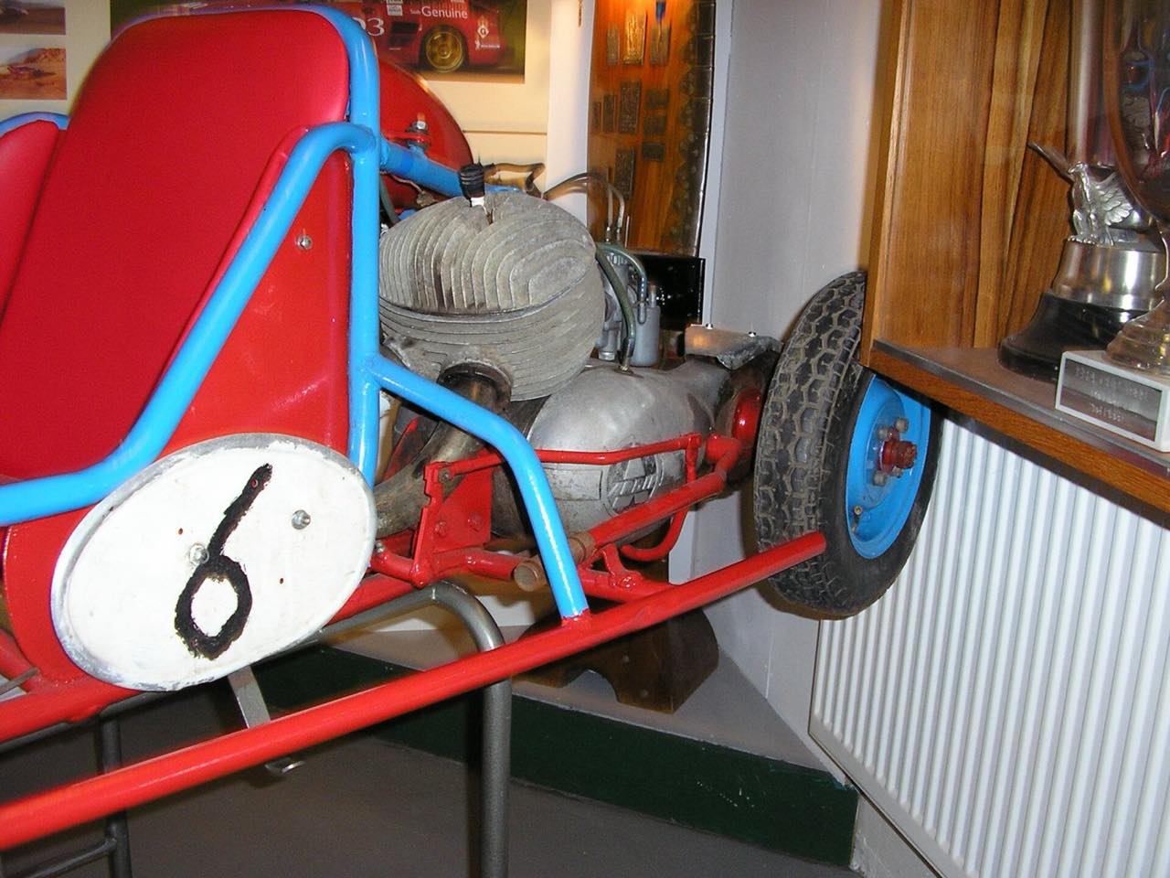 A finished tube-frame kart from behind